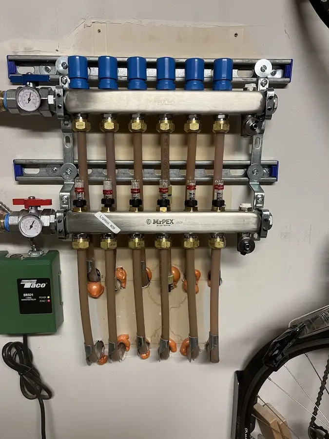 Plumber performing Gas Line Installation at a residential property in Baldwin City